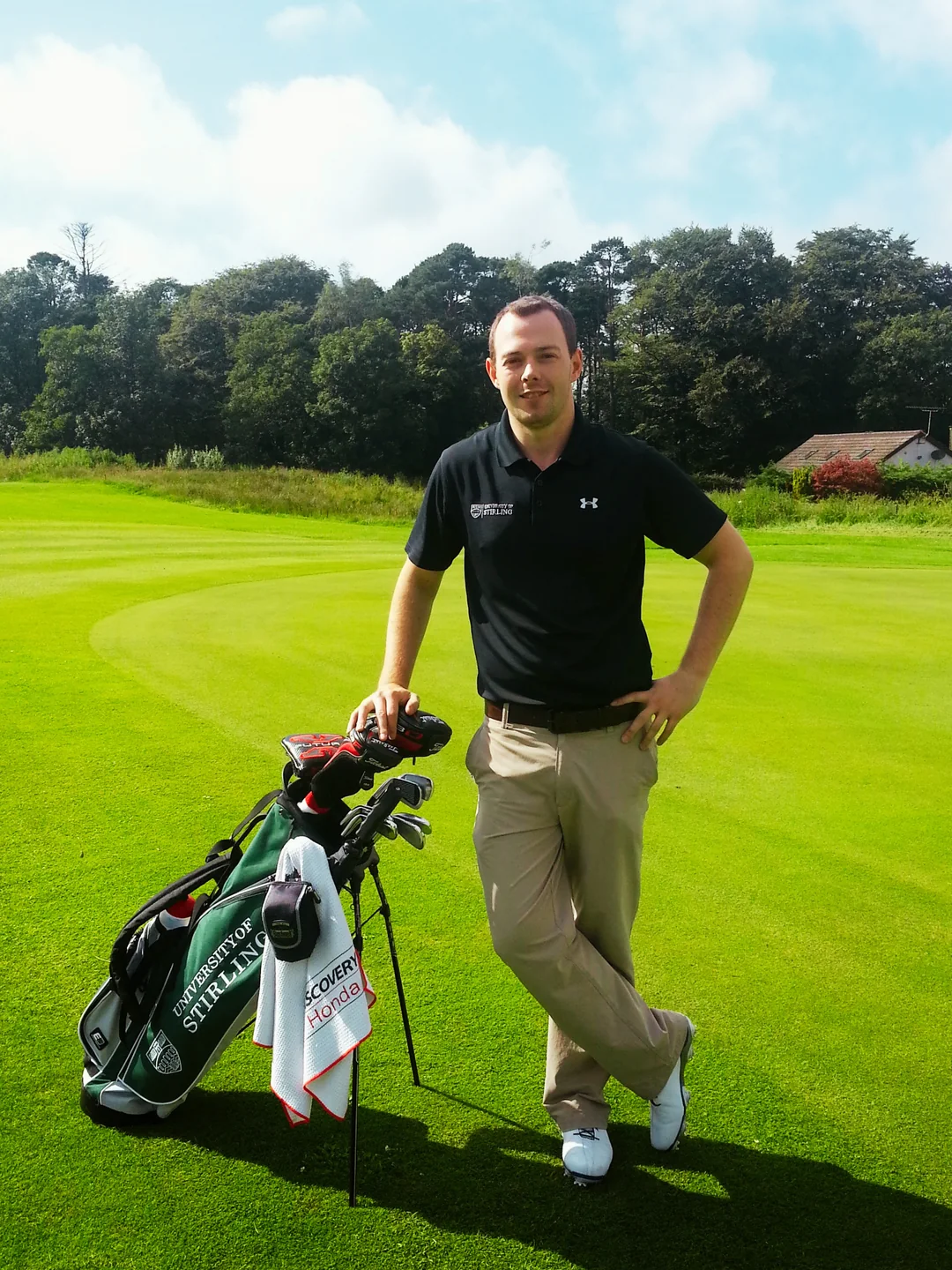 Philip Neil, PGA of Canada Class “A” golf professional, on the course with his clubs